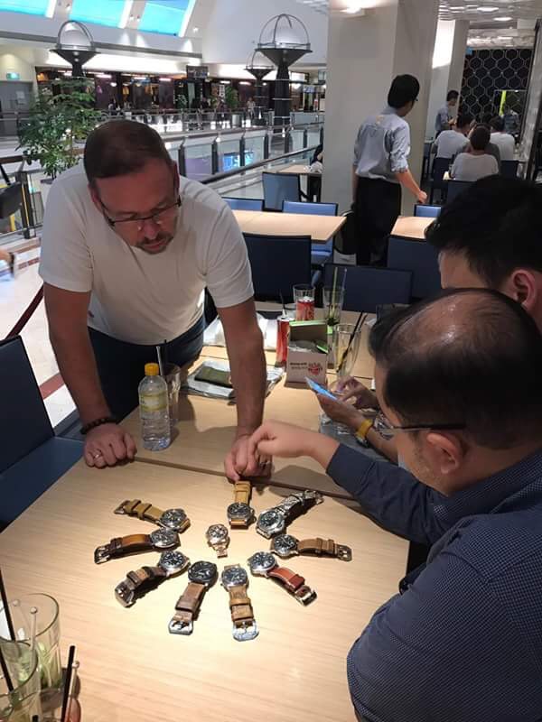 Putting the watches for a table shot 